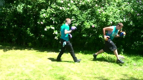 My brother (kinda) boxing his friend.