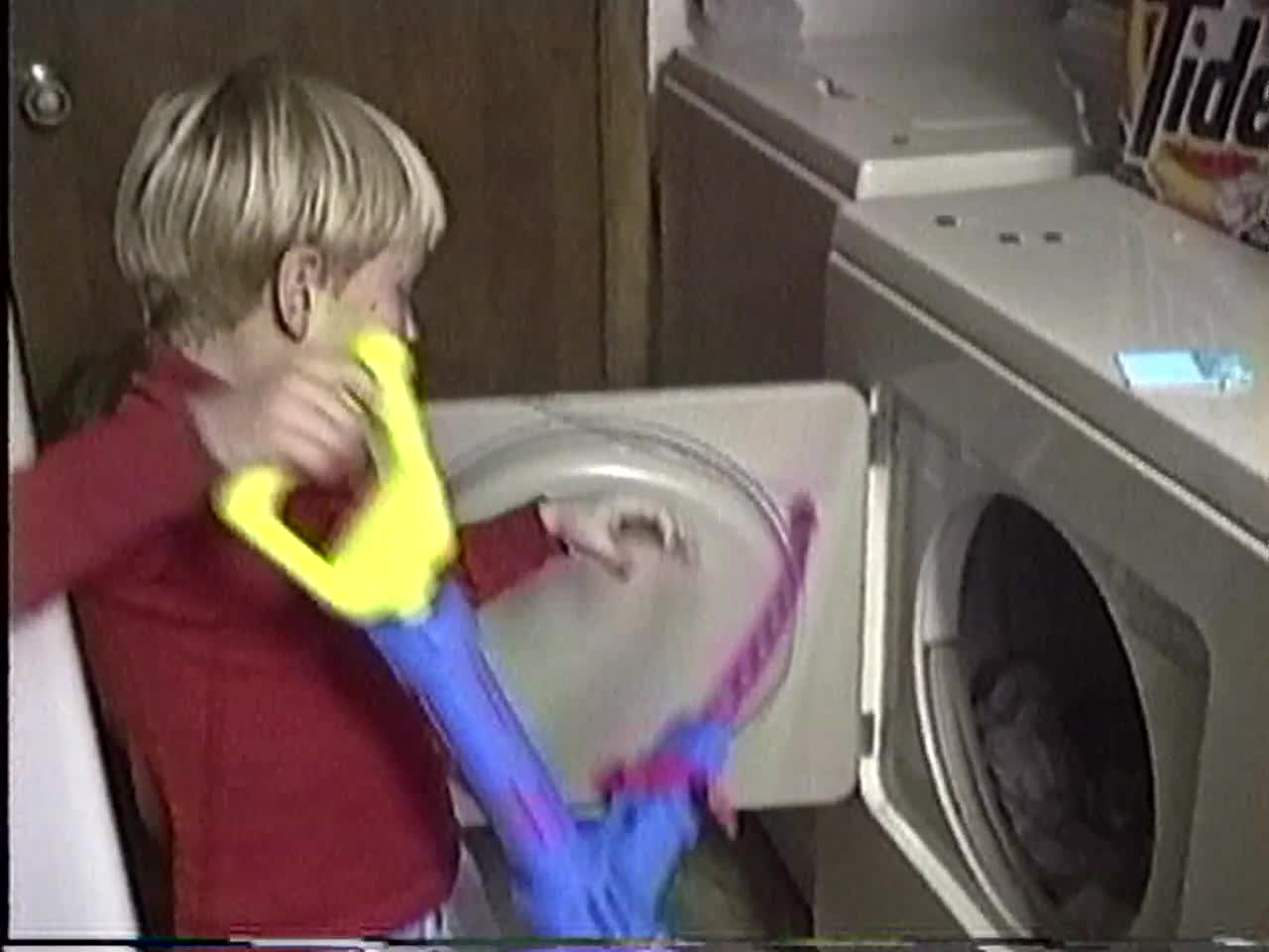 Little sister in the laundry dryer... Wait for it!