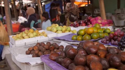 Panning Along Produce at a Market