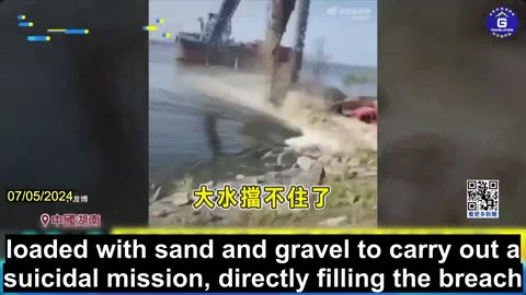 The Chinese Authority Deploys Loose Sand to Seal Breach On Levee Of Dongting Lake