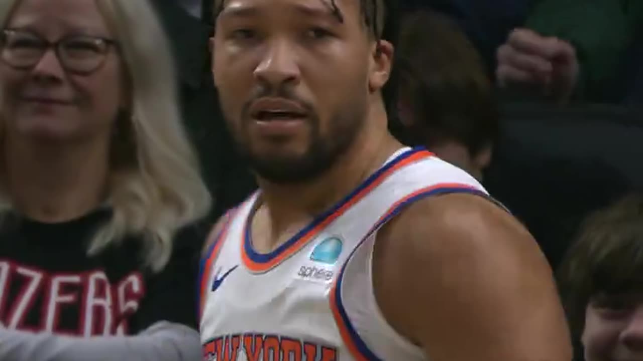 Jalen Brunson tosses it high off the glass to cash in on the and-1!