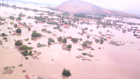 Only rooftops visible in aerial video of Greece floods