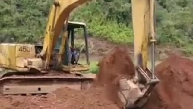 6 year old boy driving excavator