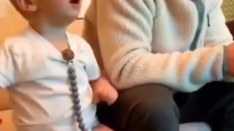 Little boy copy our father reactions