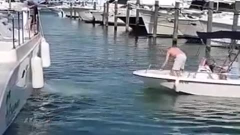 Man lets his wife drive the boat