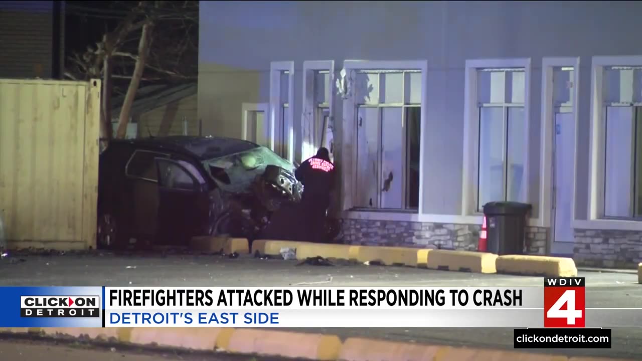 Crowd attacks firefighters while they were trying to rescue two people trapped in an SUV