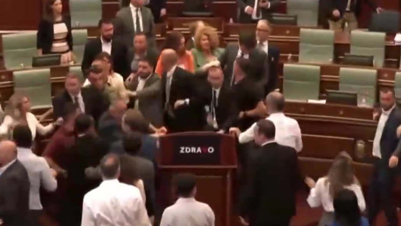 Brawl broke out in Kosovo's parliament as lawmakers grappled with one another