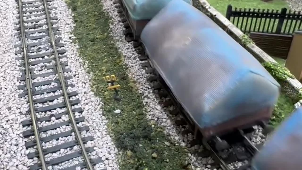 Class 47 47256 BR Green Full Yellow Ends Weathered pulling china clay wagons pulling freight.