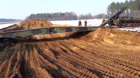 German technology tank making bridge by himself