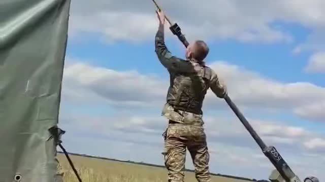 Ukrainian soldier celebrates the capture of a Russian BMD-2 in the Kherson region.