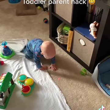 Baby crawls for laser pointer for cats. Ultimate parenting hack 😆