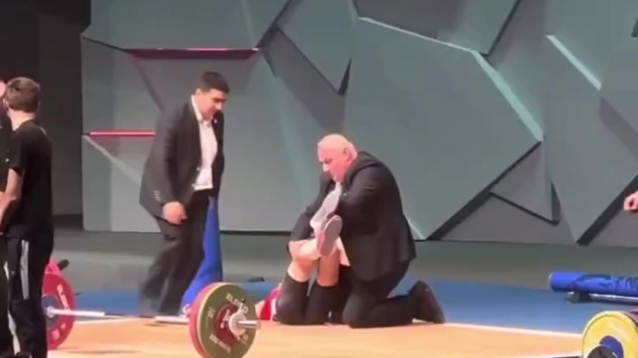 weightlifter passes out after lift.