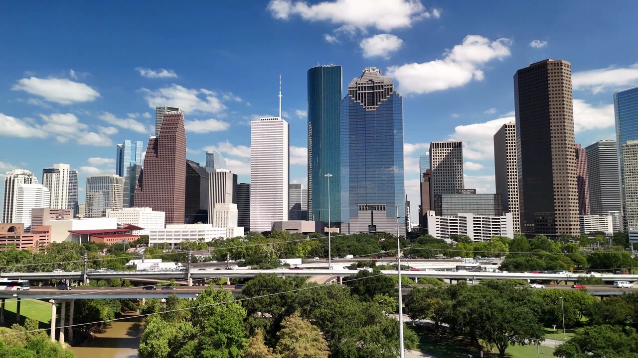 Downtown skyline near allen parkway and Sabine in Houston Texas Drone Video