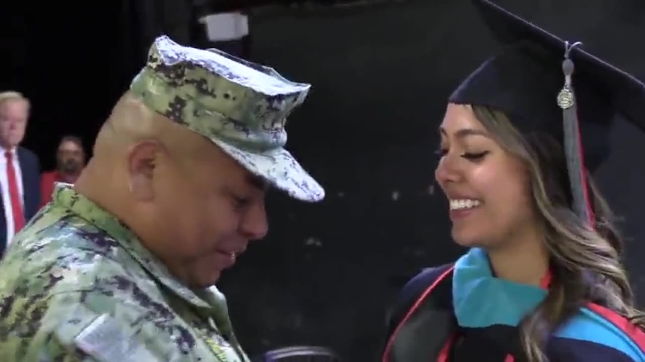 Navy Officer Travels Over 30 House To Surprise Daughter At Graduation Ceremony