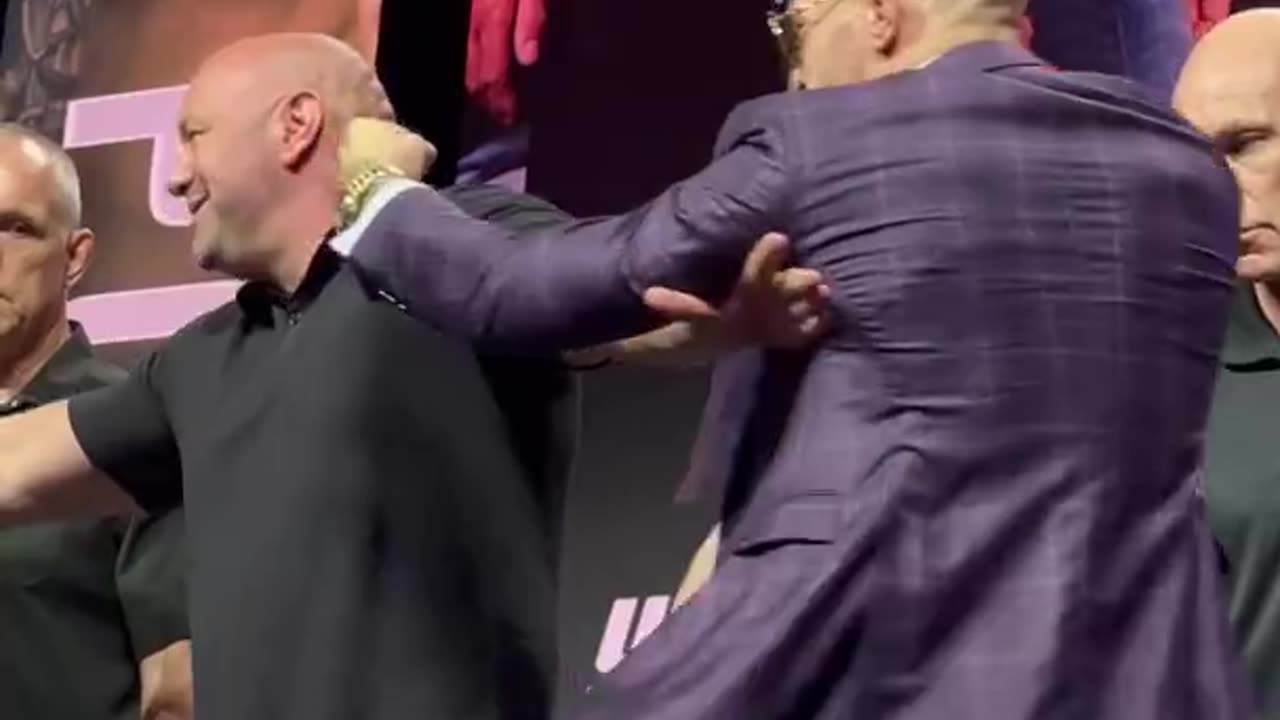 Conor McGregor and Dustin Poirier face off at the UFC 264 Press Conference.