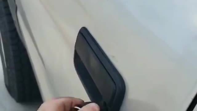 Improvising for a Broken Door Handle on a Truck