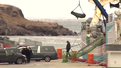 Survivors, bodies of sunken trawler crew arrive in Spain