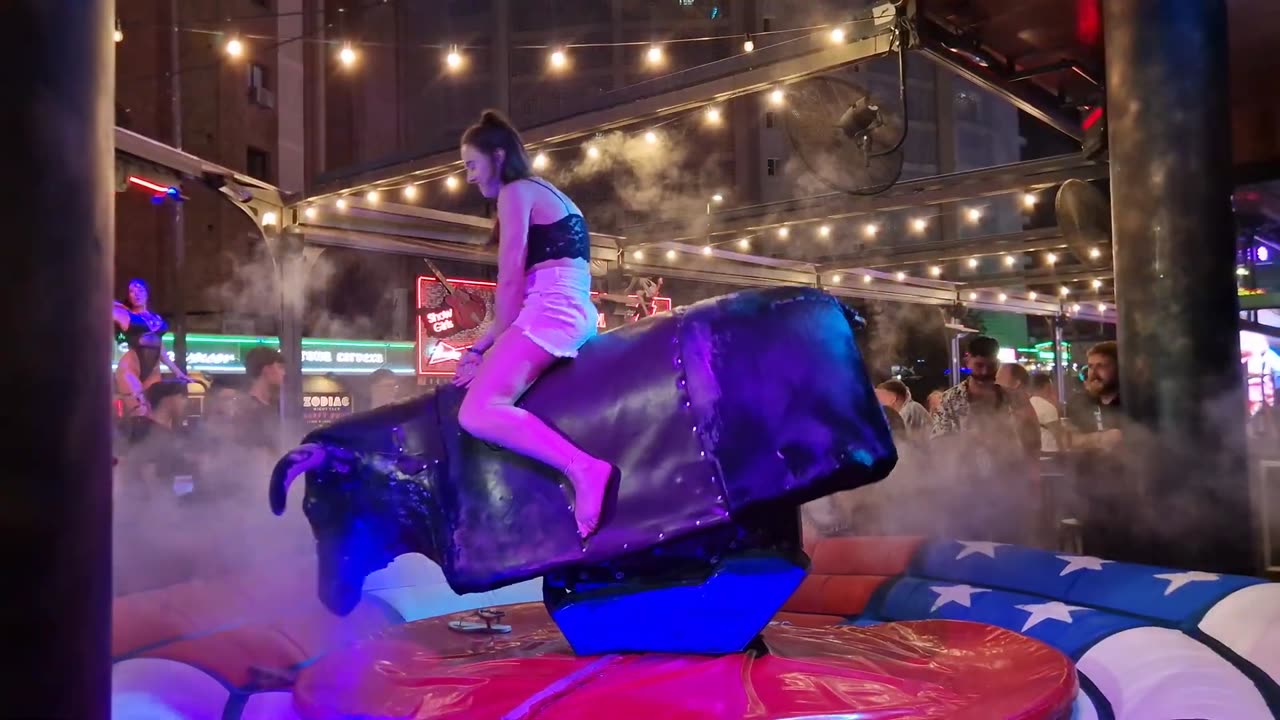 GIRL TAKE ON THE BULL! Benidorm Bull Ride. Mechanical Bull EPIC FAIL