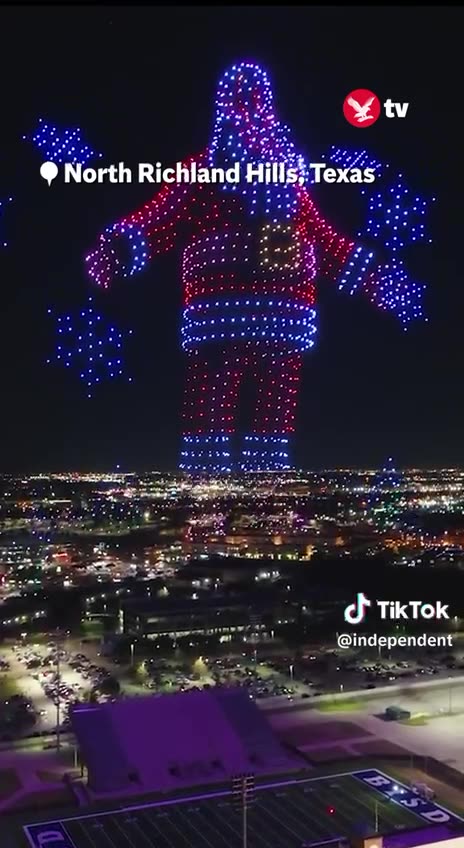Giant Santa Over Texas Town