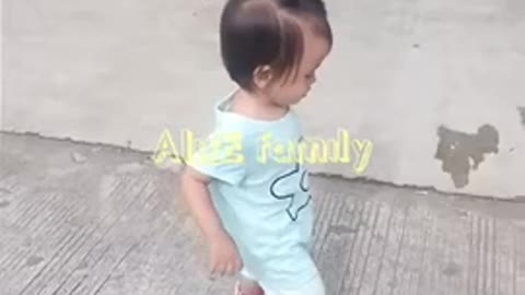 Baby girl learning to walk