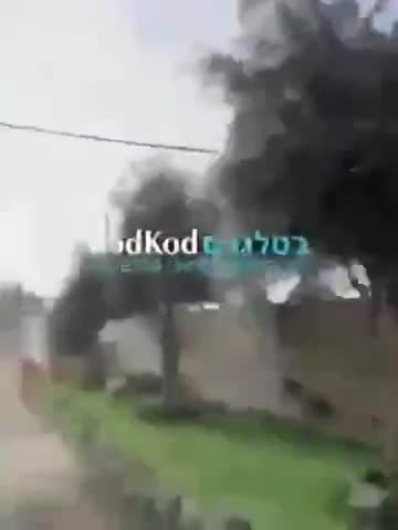 ISRAELI SOLDIERS RUN TO TAKE COVER AS HEZBOLLAH STRIKES THEIR BASE IN THE GOLAN