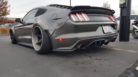 Widebody Mustang with a 3_straight pipe.