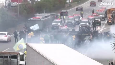 Brazilian police fire water cannons and rubber bullets at anti Lula protesters