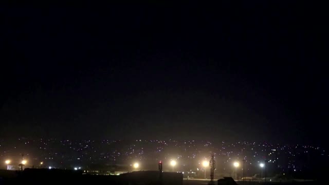 Fireworks, flares surround final flight out of Kabul