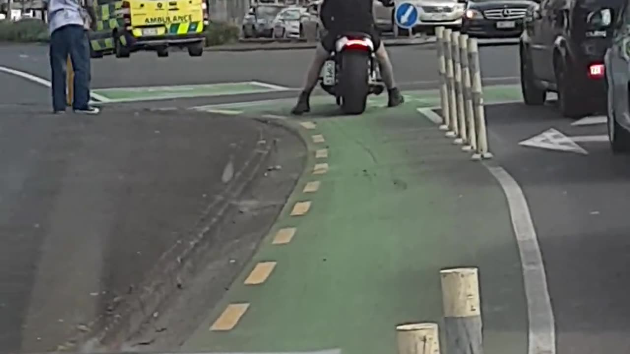 Biker Gets His Helmet Cleaned