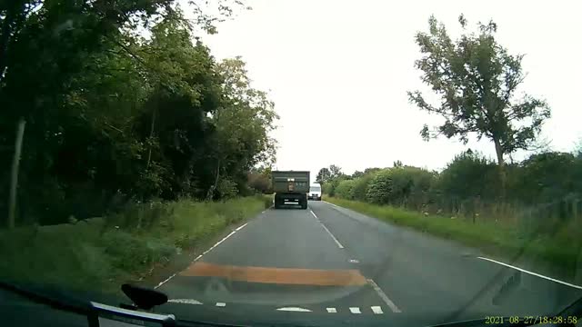 Tractor Hits Overtaking Van