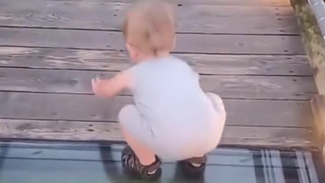 Child walking on transparent floor🧒