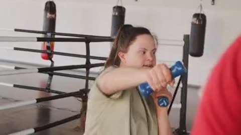 Strength Knows No Limits: Watch This Inspiring Woman with Down Syndrome Crush It with Dumbbells!