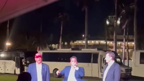 President Trump, Elon Musk, and Chris Macchio sing God Bless America at the Mar a Lago