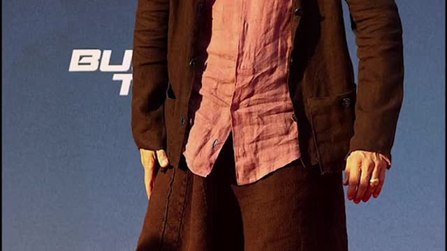 Brad Pitt rocking a skirt on the red carpet