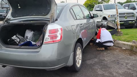 CAR CRASH AT CAR DEALERSHIP