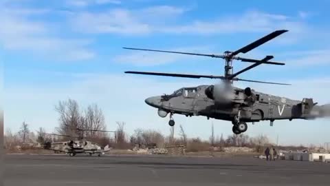 Russian Ka-52 firing on Ukrainian positions.