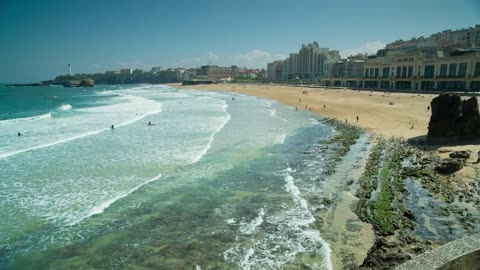 Ocean waves bursting on the shore of the coast