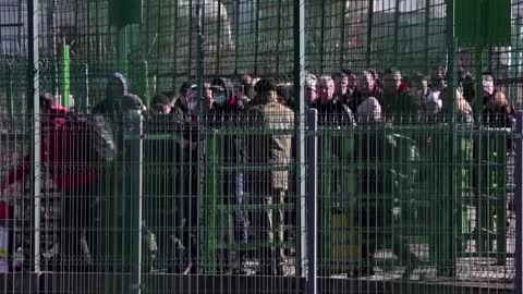 'It's hard to process': Ukrainians flee to Poland