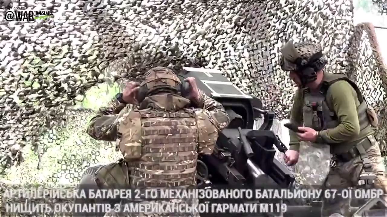 Ukrainian artillery battery operating the American M119 howitzer.