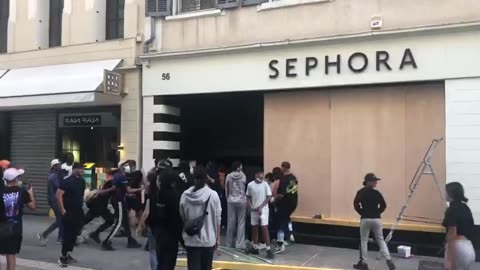 Even boarding up stores didn't prevent looting in Marseille...