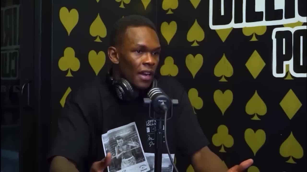 Israel Adesanya DEFENDS Andrew Tate