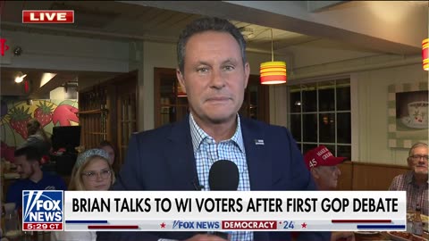 Brian Kilmeade speaks with Republican presidential candidates after the debate