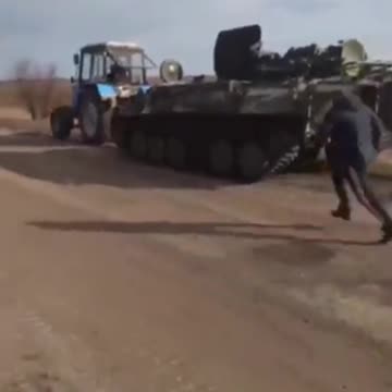 Ukraine Russia War : Ukrainian Farmers take Russia tanks and weapons vehicles
