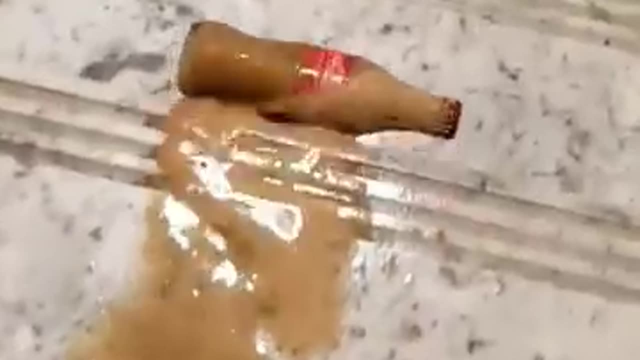 Bottle rolling down stairs