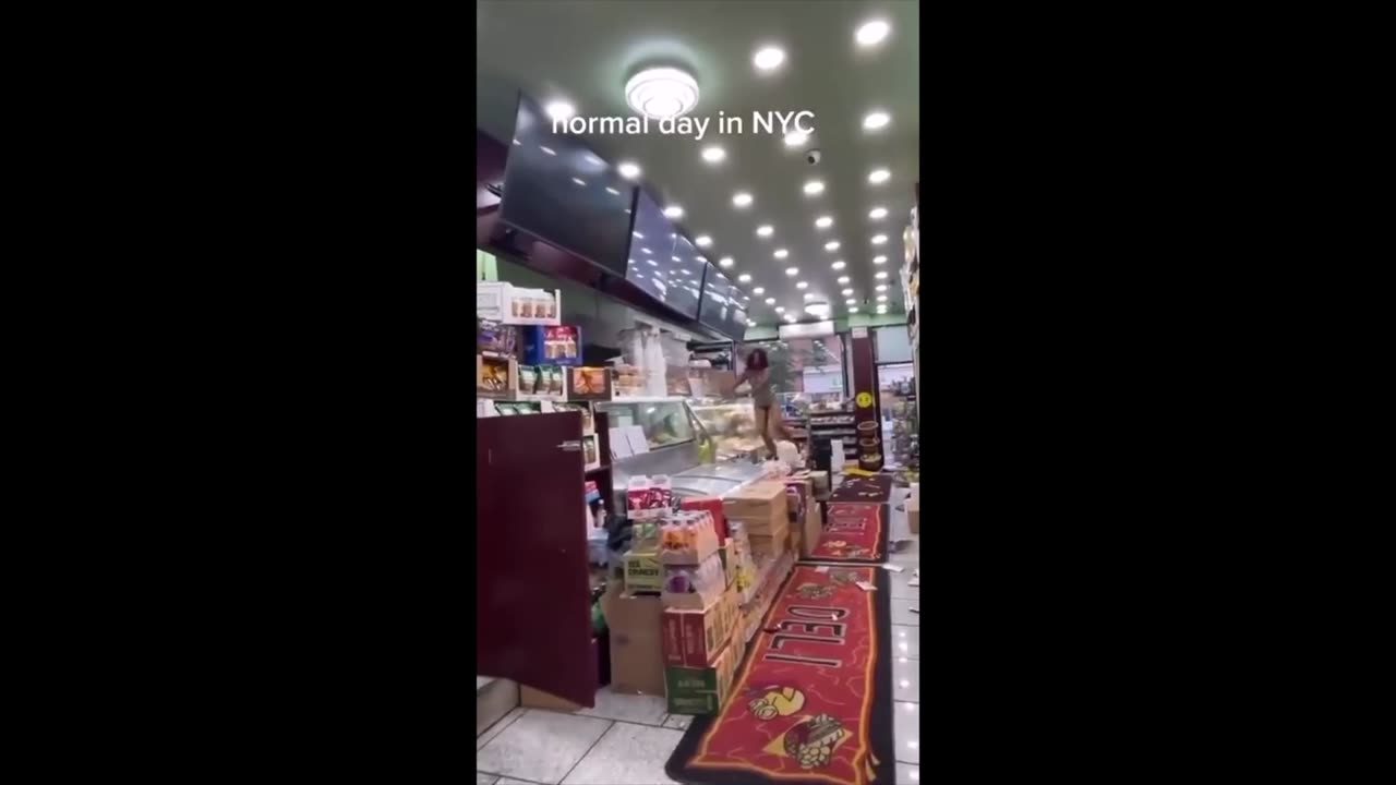 chick raging in shop with no pants on gets a can to the head.