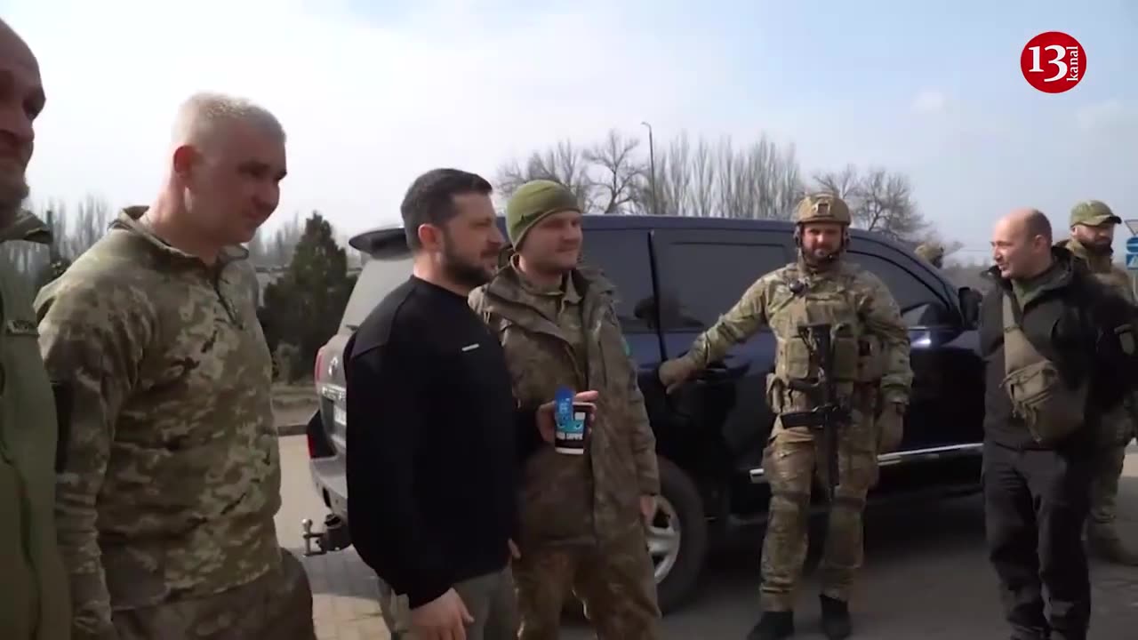 Zelenskiy drinks coffee at east Ukraine gas station