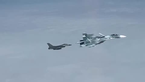 A Sukhoi Su-27P fighter of the Kaliningrad Naval Fleet coldly sweeps away a Danish F-16