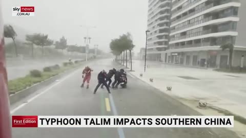 Thousands evacuate as Typhoon Talim lashes Southern China