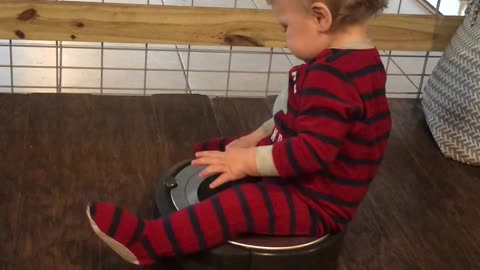 Toddler Loves Riding Roomba