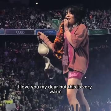 Billie eilish showing bikini (bra) in front of fans telling very warm